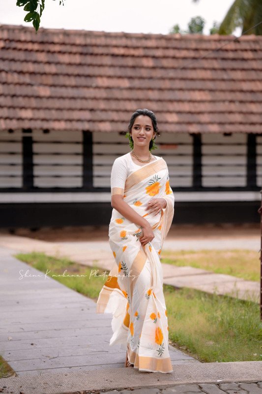 Sai Ram Textile's Handloom Pure Cotton Marigold Saree